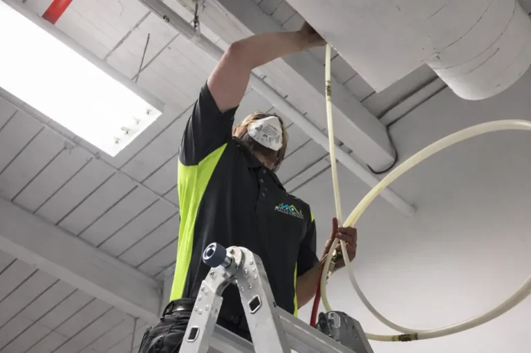 Technician inspecting HVAC 2